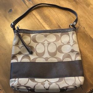 Coach bag with extra cross body attachment.